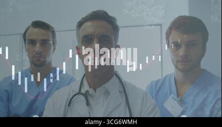 Médecin debout analysant le diagramme de tendance rouge en chandelier dans le couloir, avec stéthoscope et blouse de laboratoire Banque D'Images