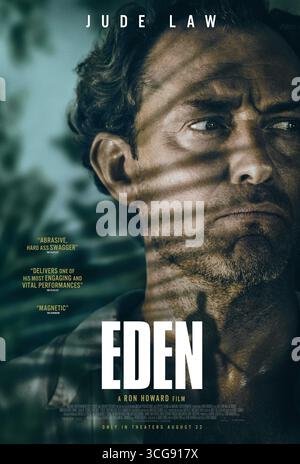 Eden (2024) réalisé par Ron Howard et mettant en vedette Jude Law dans le rôle du Dr Friedrich Ritter, un homme fuyant l'Allemagne après la première Guerre mondiale pour découvrir le véritable but de la vie sur les îles Galápagos. Sa vision idéaliste est remise en question par les réalités de la vie insulaire et les ambitions contradictoires des autres colons. Affiche de personnage AMÉRICAINE À USAGE ÉDITORIAL EXCLUSIF. Crédit : BFA / vertical Banque D'Images