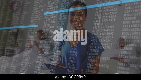 Équipe médicale féminine debout avec stéthoscopes examinant la tablette dans le hall de l'hôpital, avec superposition de code Banque D'Images