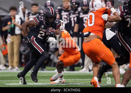 Atlanta, Géorgie, États-Unis. 31 août 2025 : les Gamecocks de Caroline du Sud Running Back Oscar Adaway III (27) jouent le ballon pendant la première mi-temps contre les Virginia Tech Hokies lors du match de lancement de l'Aflac 2025 au Mercedes-Benz Stadium d'Atlanta, Géorgie. (Scott Kinser/CSM) (crédit image : © Scott Kinser/Cal Sport Media) crédit : Cal Sport Media/Alamy Live News Banque D'Images