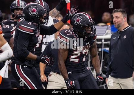 Atlanta, Géorgie, États-Unis. 31 août 2025 : South Carolina Gamecocks Running Back Oscar Adaway III (27) célèbre après avoir obtenu une première baisse contre les Virginia Tech Hokies dans la première moitié du match de lancement de l'Aflac 2025 au Mercedes-Benz Stadium d'Atlanta, Géorgie. (Scott Kinser/CSM) crédit : Cal Sport Media/Alamy Live News Banque D'Images