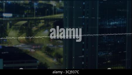 Affichage de la superposition de grille de ligne pointillée dans le bureau la nuit, avec des lumières de route et façade réfléchissante Banque D'Images