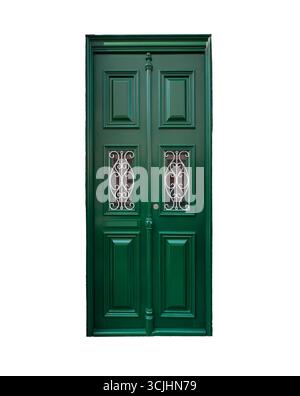 Élégante porte en bois vert avec panneaux symétriques et deux grilles ornementales en fer forgé sur verre dans la partie supérieure. La porte est isolée sur un Banque D'Images