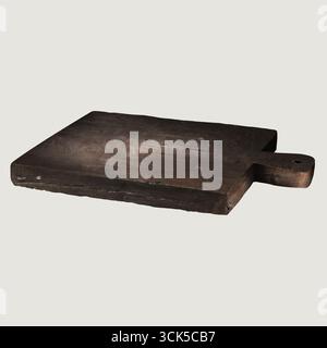 Une planche à découper en bois, souvent utilisée dans les cuisines pour la préparation des aliments. Banque D'Images