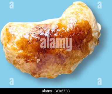 Une pâte dorée à la texture croustillante, probablement salée ou sucrée. Banque D'Images