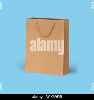 Un simple sac à provisions en papier brun avec une poignée, couramment utilisé pour transporter des marchandises. Banque D'Images