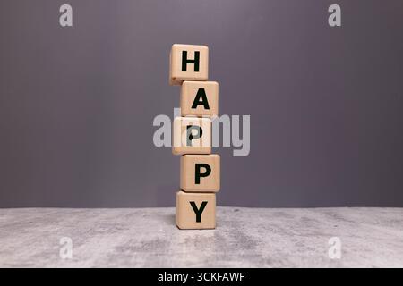 Représentation graphique du mot, heureux, écrit avec de la craie sur le tableau noir Banque D'Images