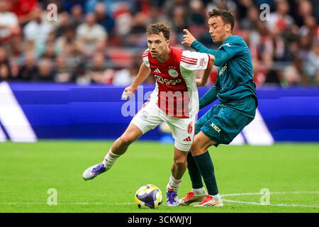 AMSTERDAM – (g-d) Youri Regeer de l'Ajax, Zico Buurmeester de PEC Zwolle lors du match Néerlandais Eredivisie entre l'AFC Ajax et PEC Zwolle au Johan Cruijff Arena le 13 septembre 2025 à Amsterdam, pays-Bas. ANP IRIS VAN DEN BROEK Banque D'Images
