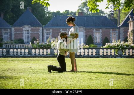 Photographie d'un charmant jeune couple attendait un bébé Banque D'Images