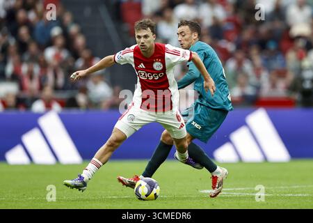 AMSTERDAM - (G-d) Youri Regeer d'Ajax, Zico Buurmeester de PEC Zwolle lors du match néerlandais Eredivisie entre l'AFC Ajax et PEC Zwolle au Johan Cruijff Arena le 13 septembre 2025 à Amsterdam, pays-Bas. ANP | Hollandse Hoogte | Maurice van Steen Banque D'Images