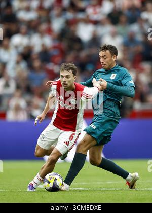 AMSTERDAM - (G-d) Youri Regeer d'Ajax, Zico Buurmeester de PEC Zwolle lors du match néerlandais Eredivisie entre l'AFC Ajax et PEC Zwolle au Johan Cruijff Arena le 13 septembre 2025 à Amsterdam, pays-Bas. ANP | Hollandse Hoogte | Maurice van Steen Banque D'Images