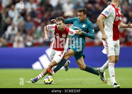 AMSTERDAM - (G-d) Youri Regeer d'Ajax, Zico Buurmeester de PEC Zwolle lors du match néerlandais Eredivisie entre l'AFC Ajax et PEC Zwolle au Johan Cruijff Arena le 13 septembre 2025 à Amsterdam, pays-Bas. ANP | Hollandse Hoogte | Maurice van Steen Banque D'Images