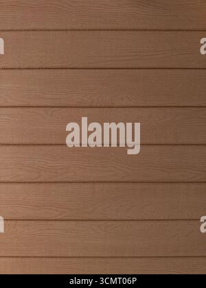 Gros plan d'un mur de parement en bois avec des planches horizontales et une texture de grain de bois naturel. Convient comme arrière-plan, texture ou détail architectural pour Banque D'Images