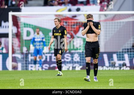 Leipzig, Allemagne. 20 septembre 2025. Marius B?lter (1. FC K?ln, 30) frustriert 1. Fu?ball Bundesliga, RB Leipzig - 1. FC K?ln, Leipzig, Red Bull Arena AM 20.09.2025 LA RÉGLEMENTATION DFL INTERDIT TOUTE UTILISATION DE PHOTOGRAPHIES COMME SÉQUENCES D'IMAGES ET/OU QUASI-VIDÉO. Crédit : dpa/Alamy Live News Banque D'Images