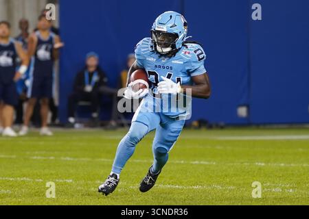 Toronto, Ontario, Canada. 19 septembre 2025. Deonta McMahon #24 des Argonauts de Toronto court la balle en deuxième mi-temps durant la semaine 16 du match 2025 de la LCF contre les Alouettes de Montréal au BMO Field. Le 19 septembre 2025 à Toronto, Canada. (Crédit image : © Leonardo Ramirez/eyepix via ZUMA Press Wire) USAGE ÉDITORIAL SEULEMENT ! Non destiné à UN USAGE commercial ! Banque D'Images