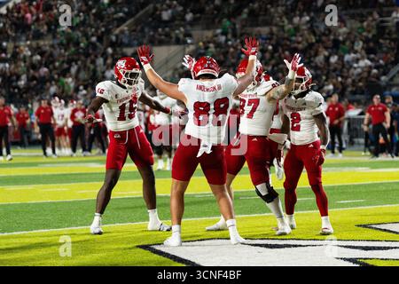 Honolulu, Hawaï, 20 septembre 2025. L'offensive de Fresno State célèbre le touchdown et la victoire ultime sur l'Université d'Hawaï 23 à 21. De gauche à droite : #15 Kamron Beachem, #88 Richie Anderson III, #87 Jake Tarwater et #2 Rayshon Luke. Crédit : Solomon Thompson/Alamy Live News Banque D'Images