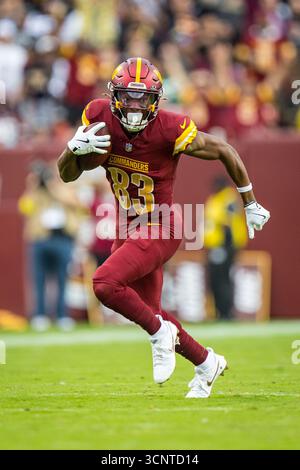Landover, Maryland, États-Unis. 21 septembre 2025. Le récepteur Wide des Washington Commanders Jaylin Lane (83) retourne le punt du joueur des Las Vegas Raiders AJ Cole (6) pour un touchdown pendant le match entre les Las Vegas Raiders et les Washington Commanders joué à Landover, Maryland. Cory Royster/Cal Sport Media/Alamy Live News Banque D'Images
