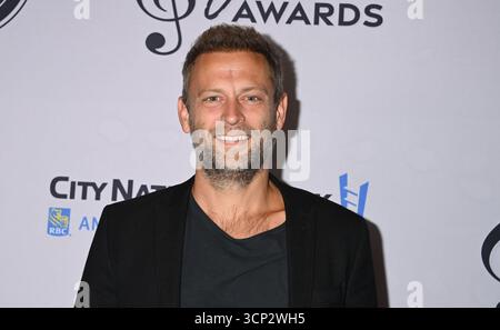 Nashville, États-Unis. 23 septembre 2025. Aaron Eshuis arrive à la 8e cérémonie annuelle des Nashville Songwriter Awards qui s'est tenue au Ryman Auditorium le 23 septembre 2025 à Nashville, TN © Tammie Arroyo/AFF-USA.com crédit : AFF/Alamy Live News Banque D'Images