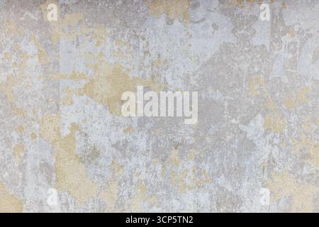 Plâtre altéré et peinture écaillée sur texture de mur de béton grunge, fond rustique Banque D'Images