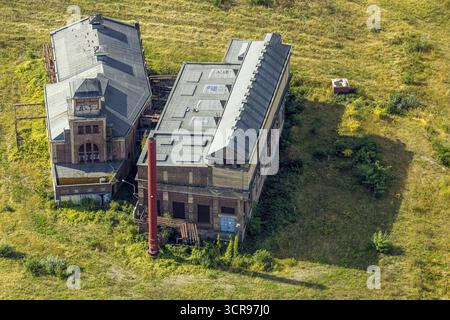 Vue aérienne, quartier verrier, bâtiments anciens et vue historique d'une ancienne mine, chantier de construction avec nouveau bâtiment pour vert et urbain qu Banque D'Images