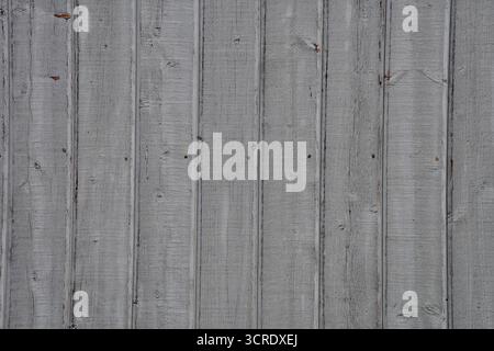 Mur vertical en bois gris. Fond de planche de bois. Banque D'Images