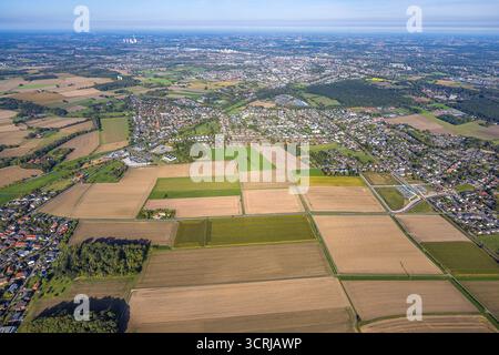 Luftbild, geplanter Haltepunkt in Westtünnen, Baustelle am Südfeldweg und von-Straße für-Thünen den künftigen Bahnhaltepunkt, Wiesen und Felder am Südfeldweg, Blick zur City, Stadtbezirk Rhynern, Hamm, Ruhrgebiet, Nordrhein-Westfalen, Deutschland ACHTUNGxMINDESTHONORARx60xEURO *** vue aérienne, escale prévue à Westtünnen, chantier de construction à Südfeldweg et von Thünen Straße pour la future escale ferroviaire, prairies et champs à Südfeldweg, vue sur la ville, quartier Rhynern, Hamm, région de la Ruhr, Rhénanie-du-Nord-Westphalie, Allemagne ATTENTIONxMINDESTHONORARx60xEURO Banque D'Images