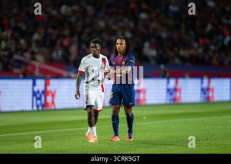 Barcelone, Espagne, 1er octobre 2025. Joueur du PSG (25) Nuno Mendes et (23) Jules Kounde lors du match de Ligue des Champions entre le FC Barcelone et le PSG au stade olympique Lluis Companys, Barcelone, Espagne, le 1er octobre 2025. Banque D'Images
