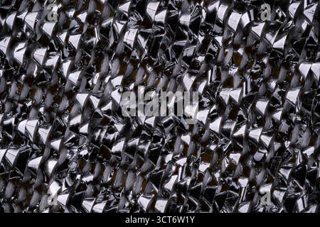 Surface métallique à récurer de la texture de l'éponge à vaisselle Banque D'Images