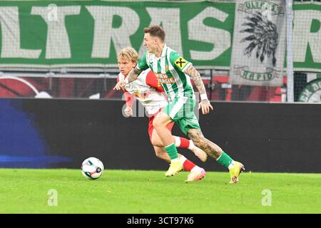 Salzbourg, Autriche. 05 octobre 2025. SALZBOURG, AUTRICHE - 5 OCTOBRE : Frans Kraetzig de Salzbourg et Bendeguz Bolla de Rapid lors du match de l'Admiral Bundesliga entre le FC Red Bull Salzburg et le SK Rapid Wien au Red Bull Arena le 5 octobre 2025 à Salzbourg, Autriche.251005 SEPA 24 027 - 20251005 PD9523 crédit : APA-PictureDesk/Alamy Live News Banque D'Images