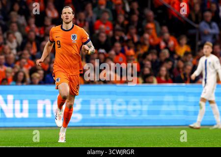 Amsterdam, pays-Bas. 12 octobre 2025. AMSTERDAM, PAYS-BAS - 12 OCTOBRE : Wout Weghorst des pays-Bas participe au match de qualification pour la Coupe du monde de la FIFA 2026 entre les pays-Bas et la Finlande au Johan Cruijff Arena le 12 octobre 2025 à Amsterdam, pays-Bas. (Photo de Ben Gal/Orange Pictures) crédit : Orange pics BV/Alamy Live News Banque D'Images