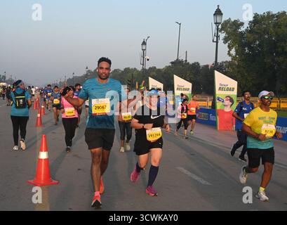 NEW DELHI, INDE - 12 OCTOBRE : les participants prennent part au semi-marathon Vedanta Delhi 2025 à Kartavya Path, le 12 octobre 2025 à New Delhi, Inde. Photo de Sonu Mehta/Hindustan Times Vedanta Delhi semi-marathon 2025 Banque D'Images