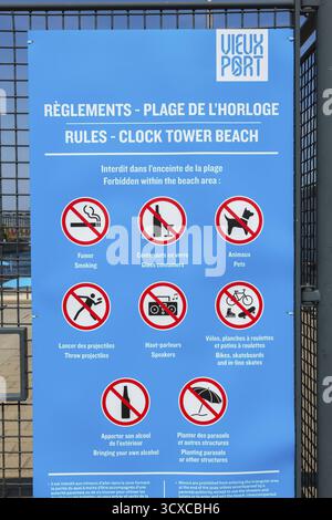 Affiche des règles avec des pictogrammes montrant diverses restrictions à la plage de la Tour de l'horloge, Vieux-Port de Montréal, Québec, Canada Banque D'Images