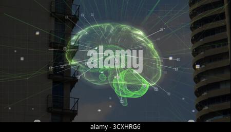 Cerveau holographique vert flottant projetant des lignes de données vert néon entre les tours, particules numériques Banque D'Images
