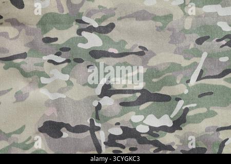 Fond de texture de tissu de camouflage de force armée multicam gros plan Banque D'Images