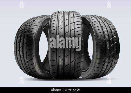 Trois pneus d'été à profil bas et dessins de bande de roulement distincts sont affichés sur fond blanc, soulignant leur aptitude à la sport Banque D'Images