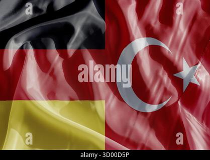 Drapeau de l'Allemagne et drapeau de la Turquie sur un tissu drapeau de l'Allemagne et drapeau de la Turquie sur un tissu en gros plan Banque D'Images