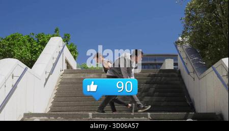 Courir deux hommes en sport dans l'escalier en béton à la plaza, avec des mains courantes, Thumbs-up Icon 90 Banque D'Images