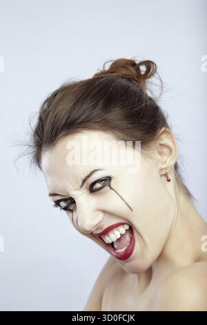 Femme pleurer avec make-up Banque D'Images