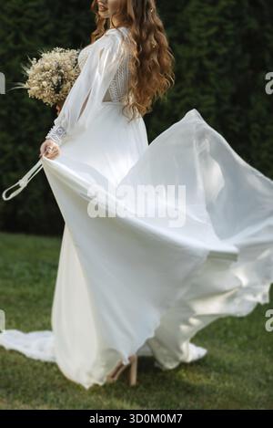 Robe de mariée parfaite le jour du mariage Banque D'Images