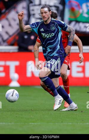 Enschede, pays-Bas. 26 octobre 2025. Enschede - Wout Weghorst de l'AFC Ajax Amsterdam court avec le ballon lors de la dixième manche de compétition de la saison Eredivisie 2025/2026. Le match se déroule entre le FC Twente et l'AFC Ajax Amsterdam au de Grolsch Veste le 26 octobre 2025 à Enschede, aux pays-Bas. (VK Sportphoto/Raymond Smit) crédit : Parallax Pictures/Alamy Live News Banque D'Images