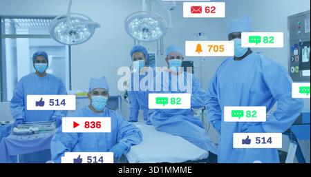 Positionnement de l'équipe chirurgicale préparant l'opération en salle d'opération, avec plafonniers chirurgicaux Banque D'Images