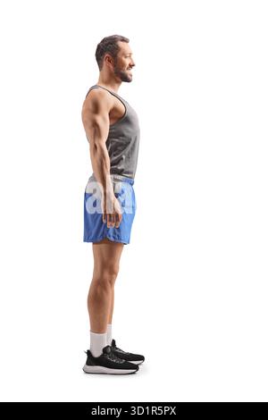 Plan de profil pleine longueur d'un homme en forme dans des vêtements de sport isolé sur fond blanc Banque D'Images