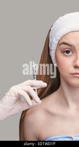 Injection au spa. Mains du médecin. Jolie patiente. Soins de beauté Banque D'Images