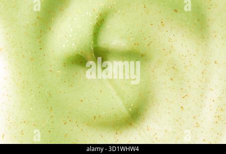 Fond de produit cosmétique. Texture de gommage verte. EMULSION nettoyante pour le visage. Gel Banque D'Images