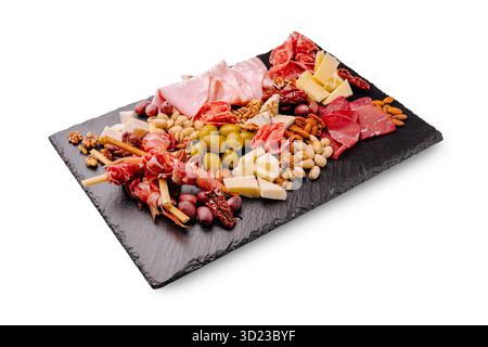 Plateau de charcuterie gastronomique avec assortiment de viandes et fromages Banque D'Images