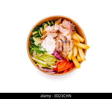 Délicieux mélange de poulet grillé, légumes frais et frites servis dans un bol Banque D'Images