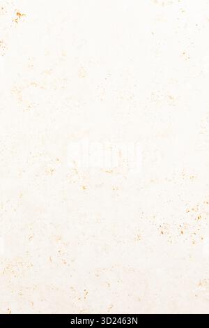 Texture de fond avec un papier aux tons neutres avec des taches subtiles et un aspect chaleureux Banque D'Images