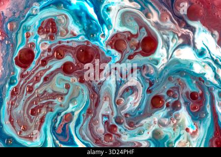 Fond psychédélique abstrait. Encre dans un liquide multicolore. Gouttes de peinture colorées se mélangeant dans l'eau. Rivière de liquide. Peinture colorée. Pho de haute qualité Banque D'Images