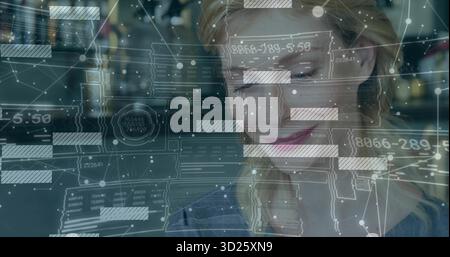 Analyste de données féminin interagissant avec des superpositions de données holographiques au bureau moderne Banque D'Images