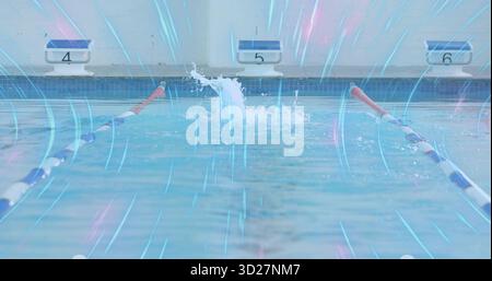 Éclaboussures d'eau en éruption envoyant des ondulations à la piscine de compétition, avec des cordes de voie et des blocs 4 5 6 Banque D'Images